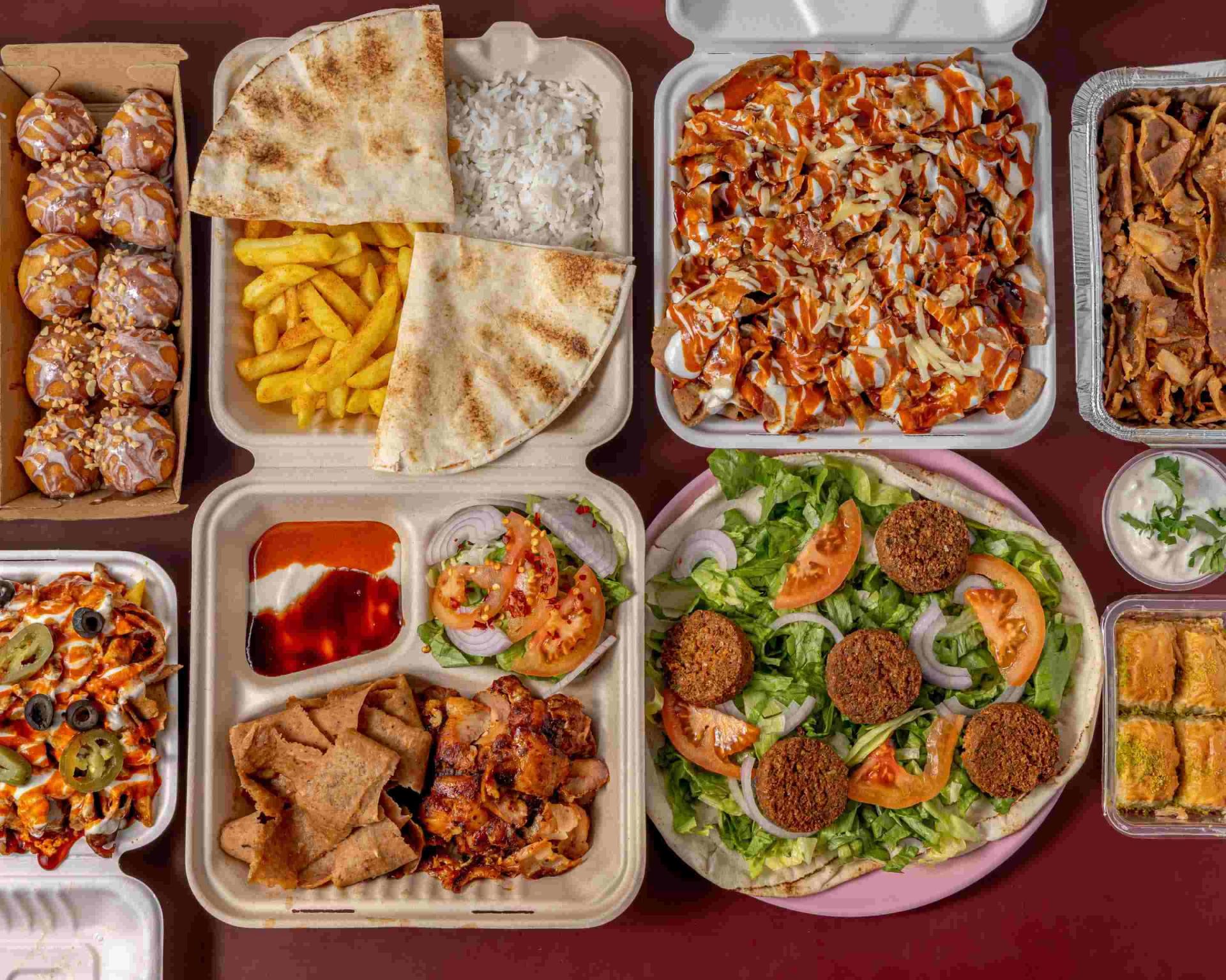 Lygon Kebab House spread — HSP, kebab plate, falafel and baklava